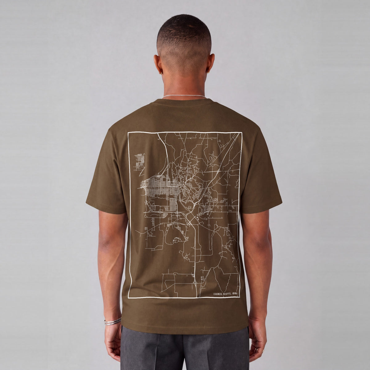 Council Bluffs map tee, back print on model - Coffee
