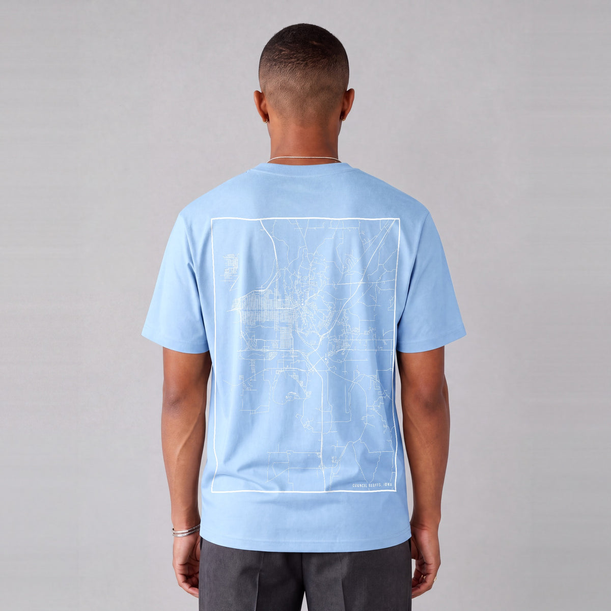 Council Bluffs map tee, back print on model - Light Blue