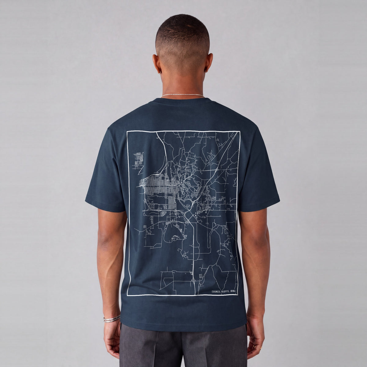 Council Bluffs map tee, back print on model - Navy Blue