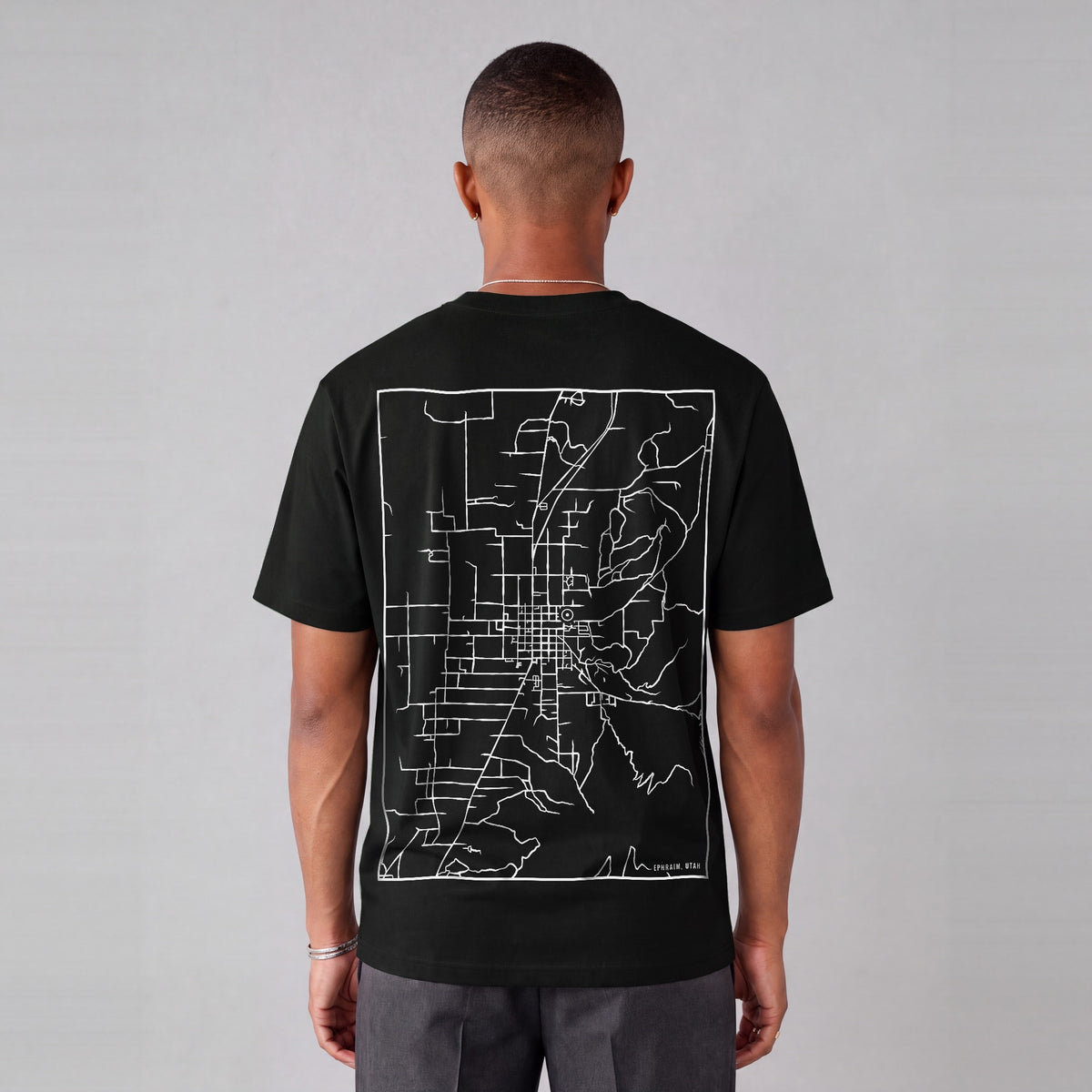 Ephraim map tee, back print on model - Black