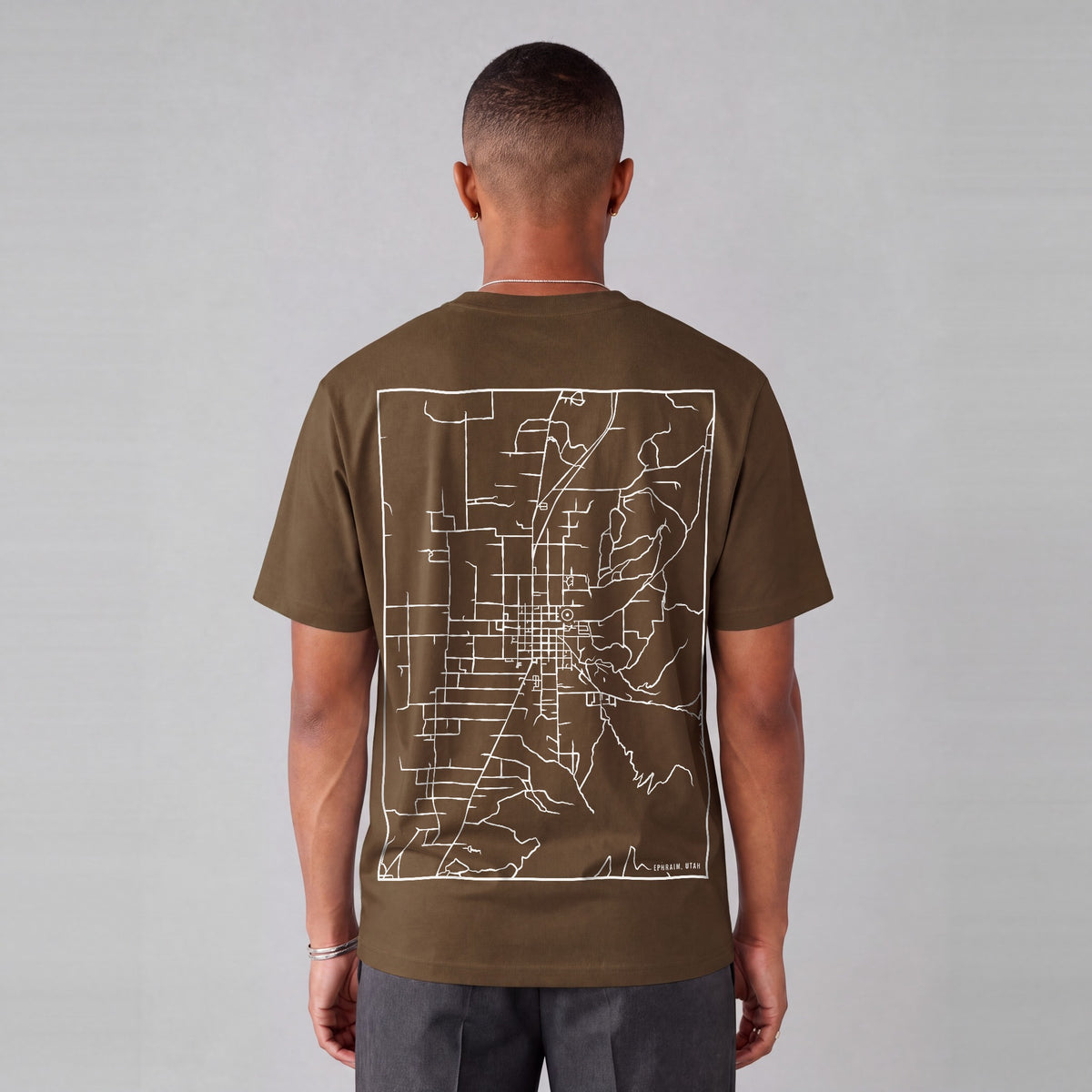 Ephraim map tee, back print on model - Coffee