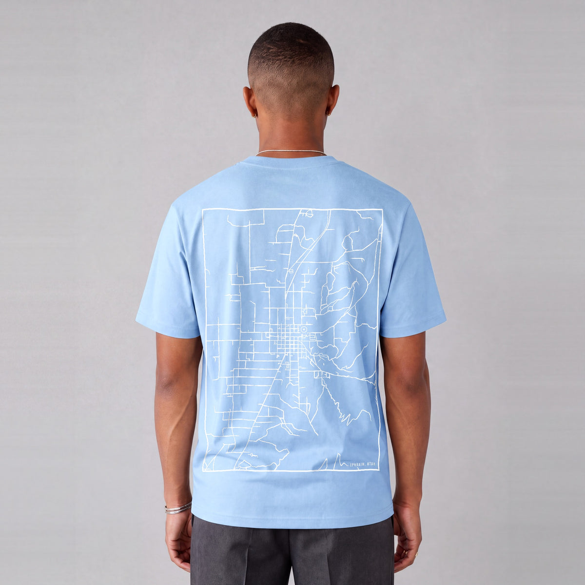 Ephraim map tee, back print on model - Light Blue