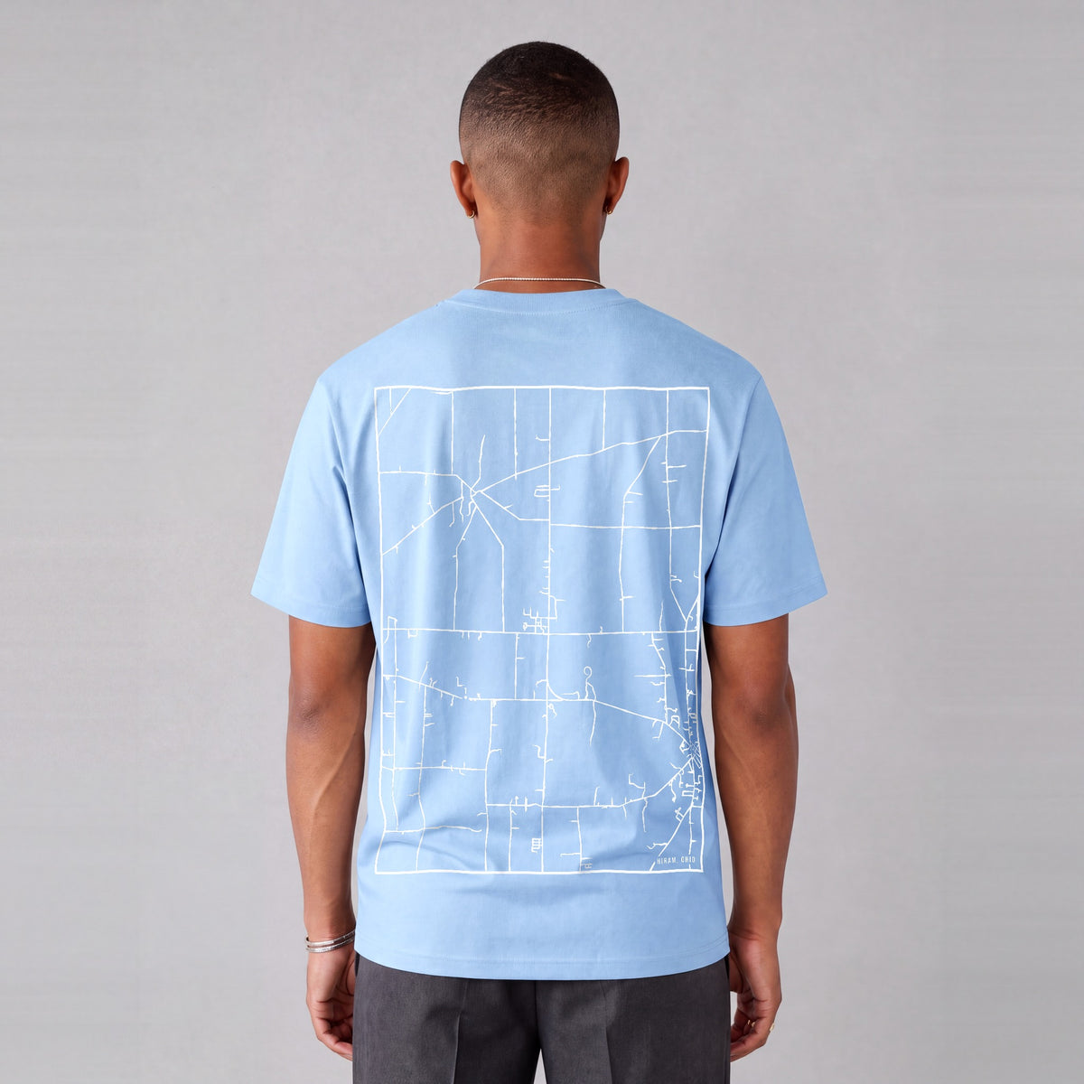 Hiram map tee, back print on model - Light Blue