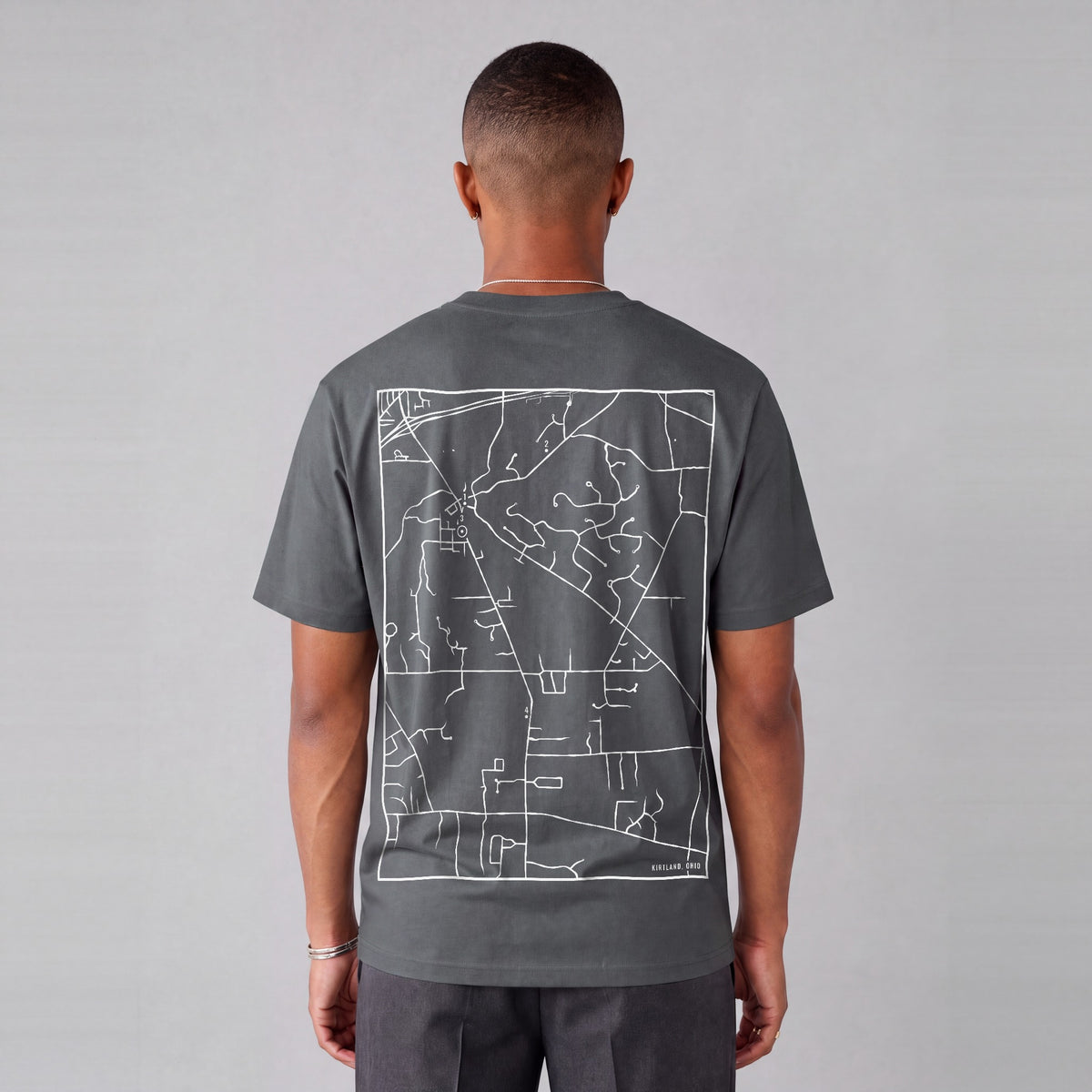 Kirtland map tee, back print on model - Charcoal
