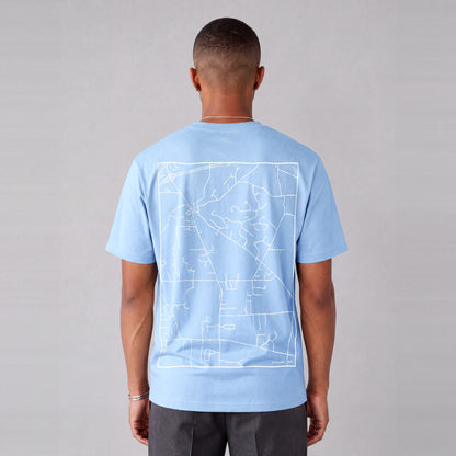 Kirtland map tee, back print on model - Light Blue