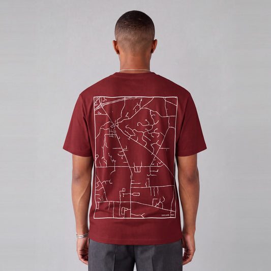 Kirtland map tee, back print on model - Maroon