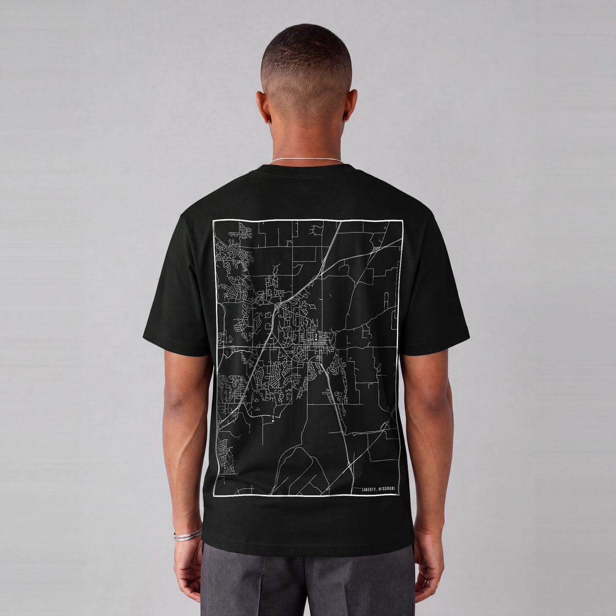 Liberty map tee, back print on model - Black