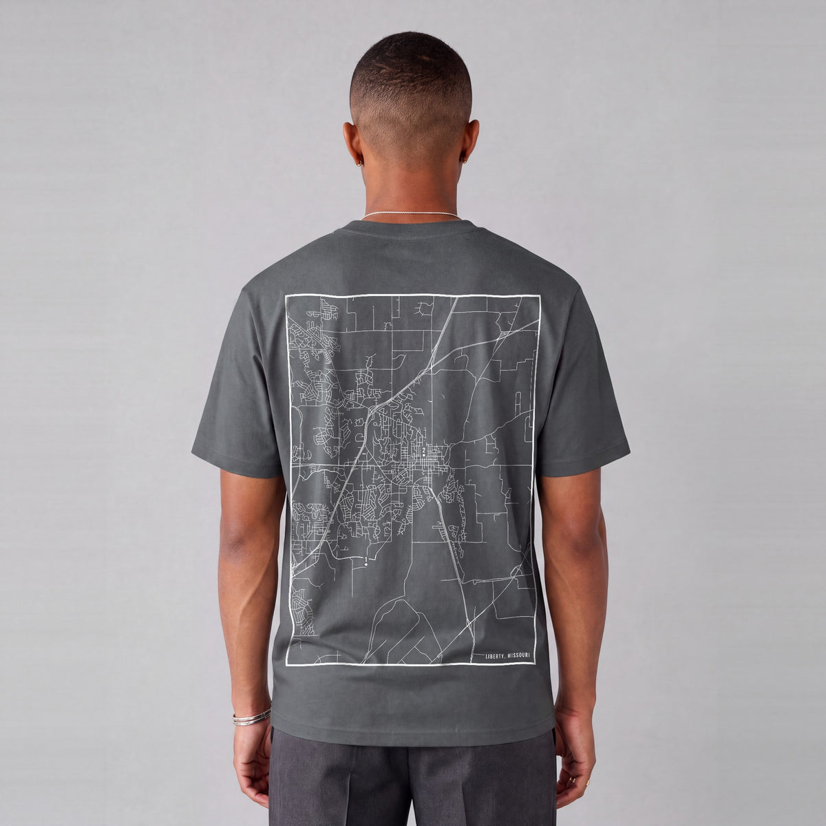 Liberty map tee, back print on model - Charcoal