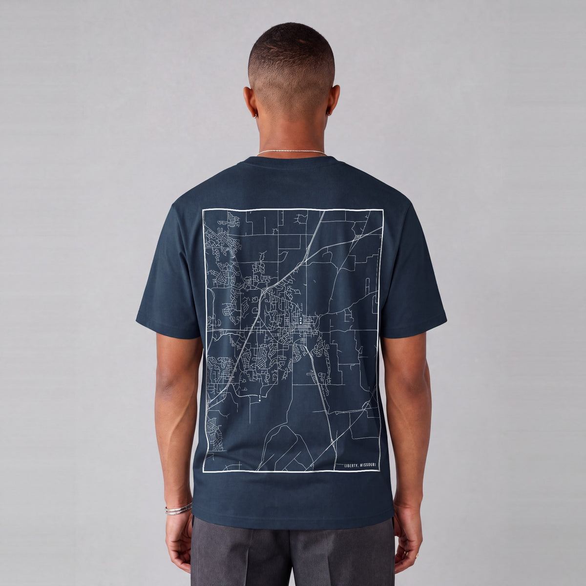Liberty map tee, back print on model - Navy Blue