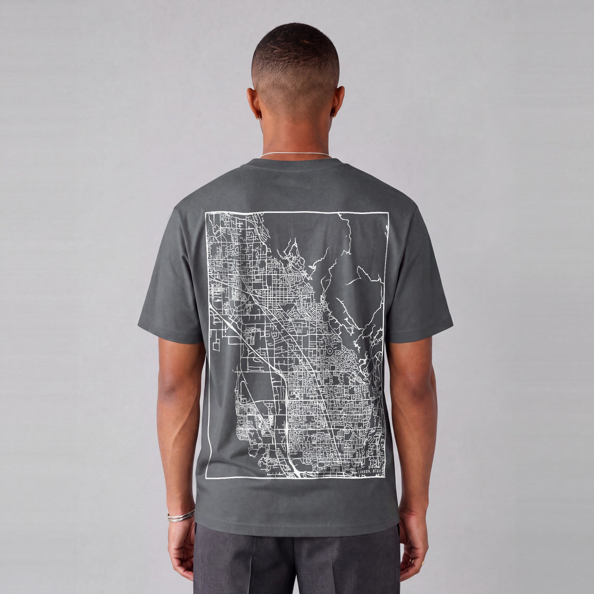 Lindon map tee, back print on model - Charcoal