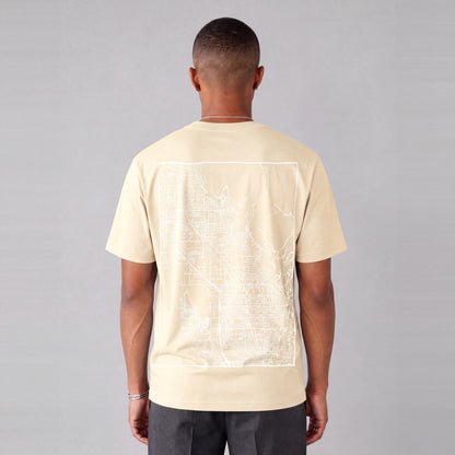 Lindon map tee, back print on model - Cream