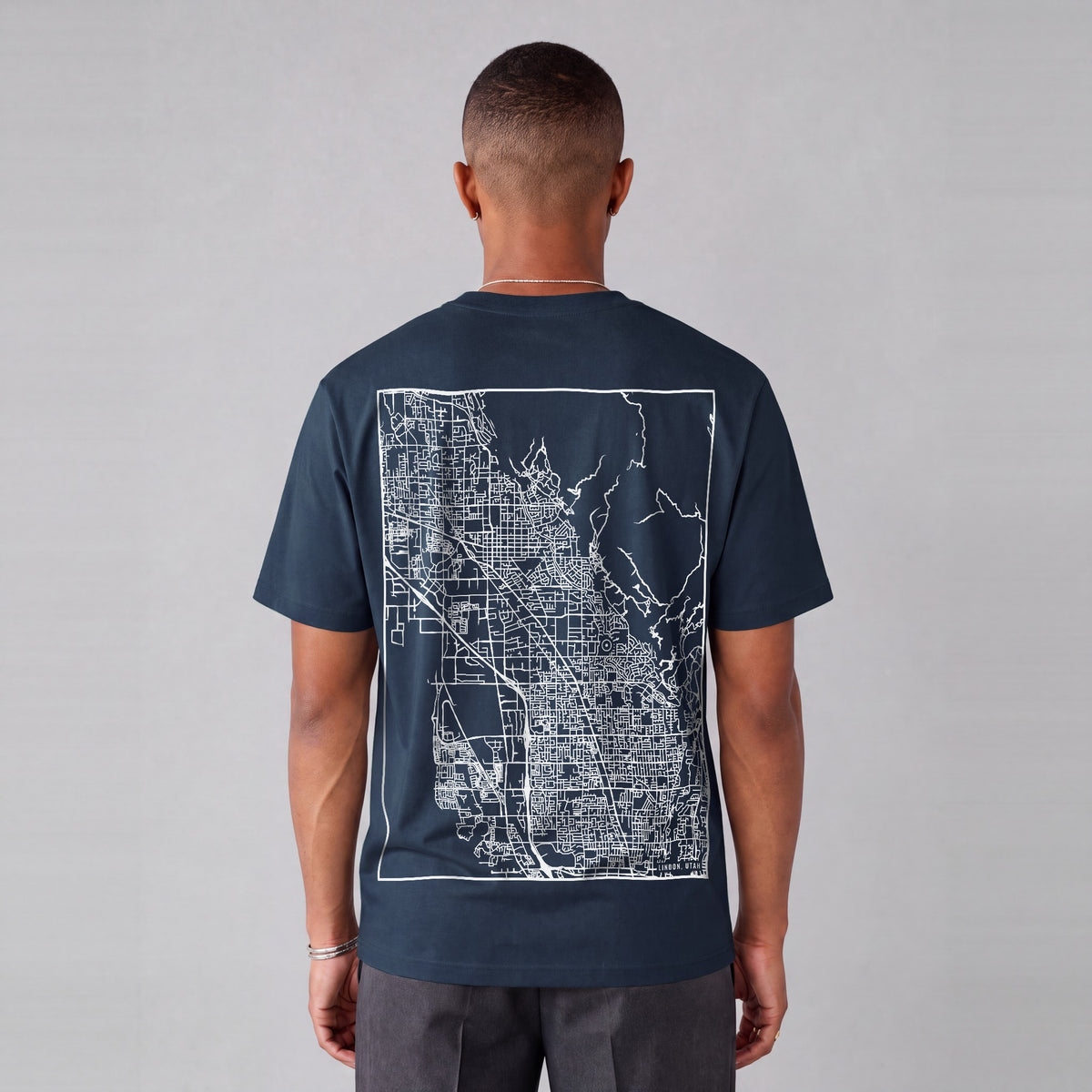 Lindon map tee, back print on model - Navy Blue
