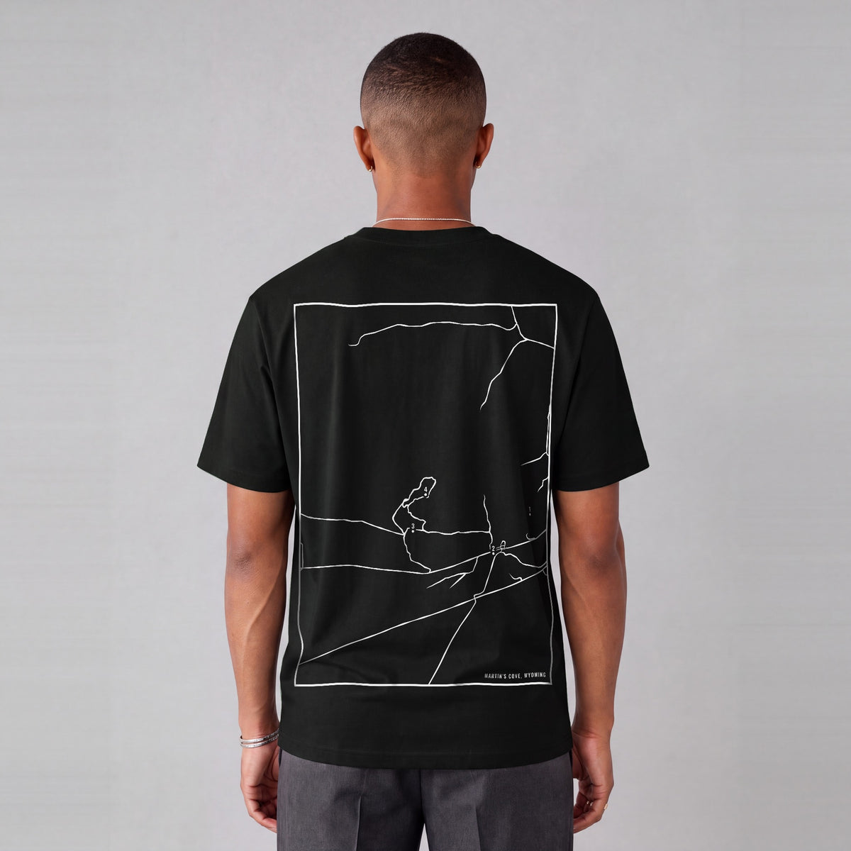 Martin's Cove map tee, back print on model - Black