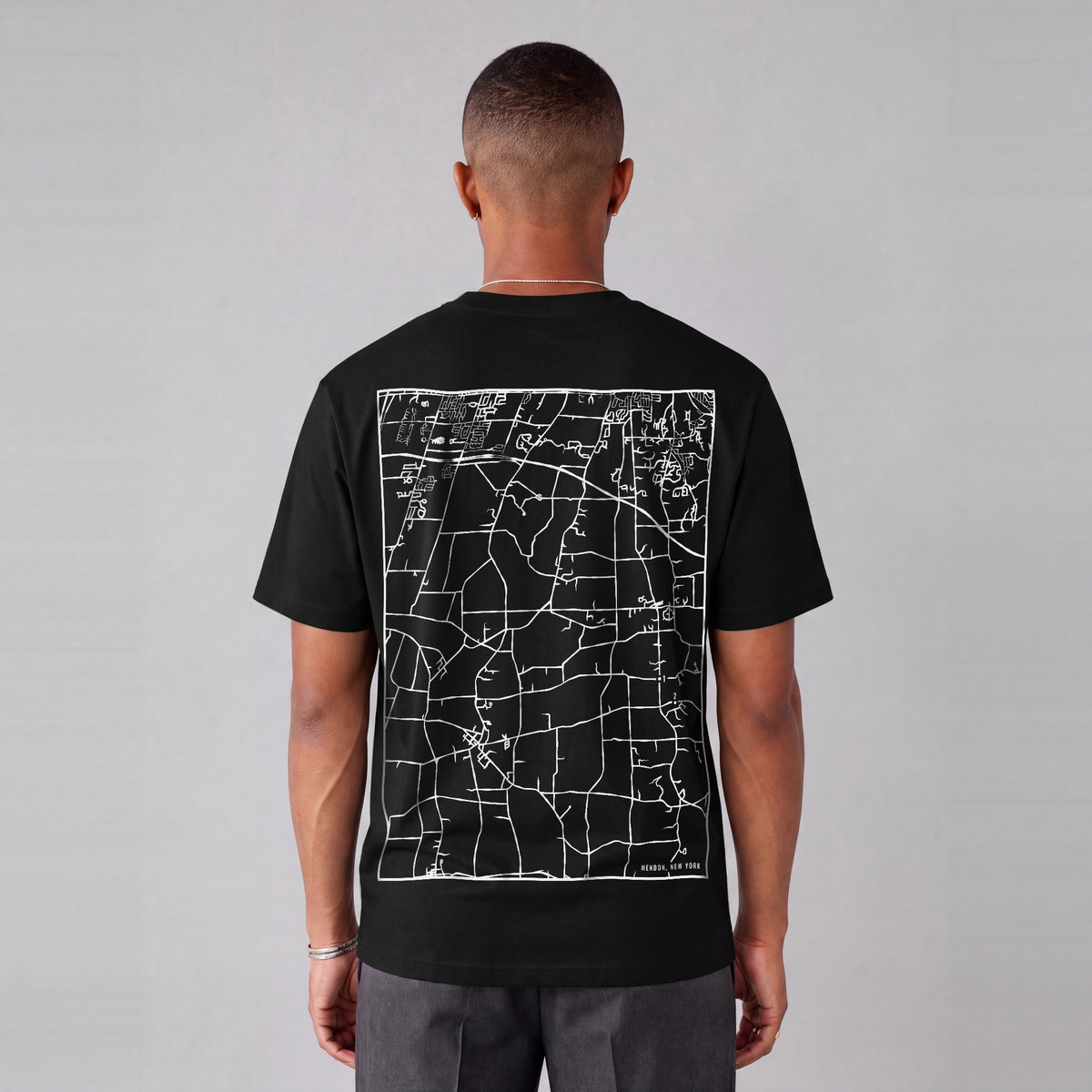 Mendon map tee, back print on model - Black