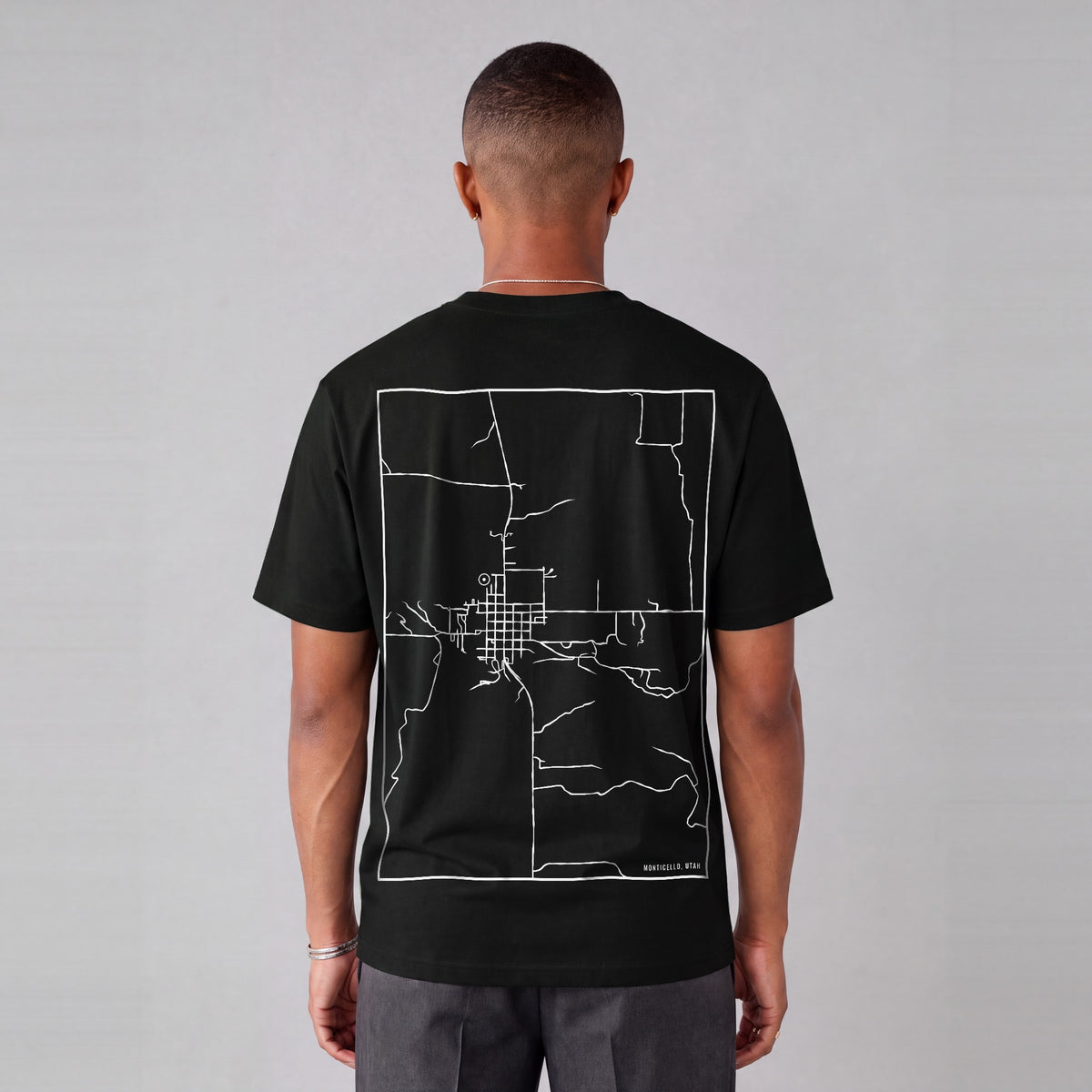 Monticello map tee, back print on model - Black