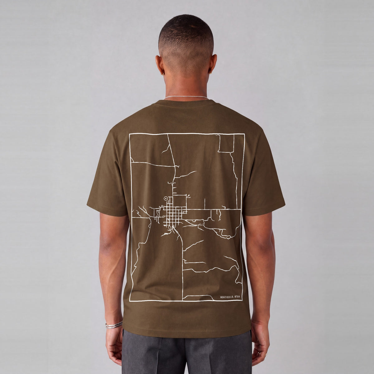 Monticello map tee, back print on model - Coffee