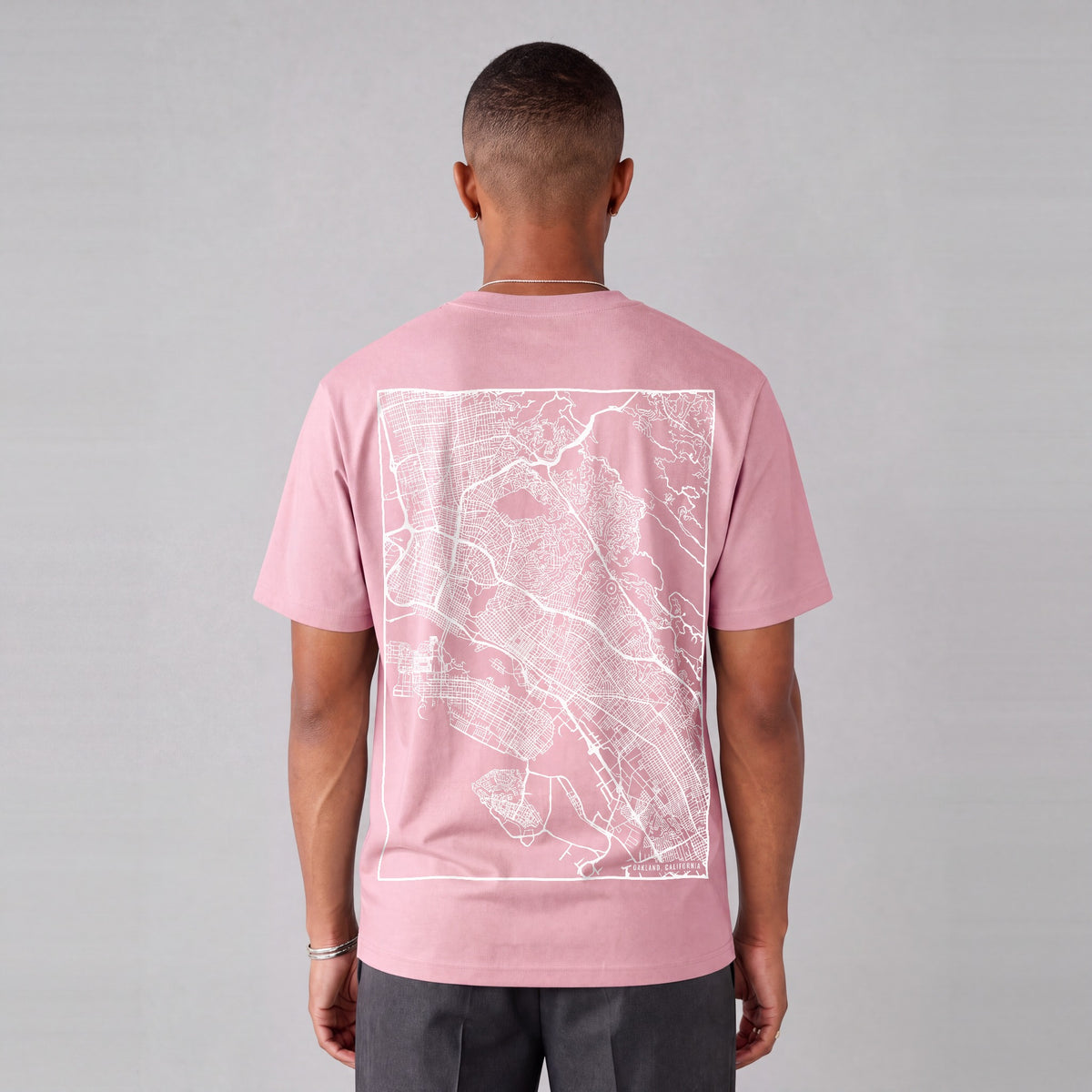 Oakland map tee, back print on model - Pink