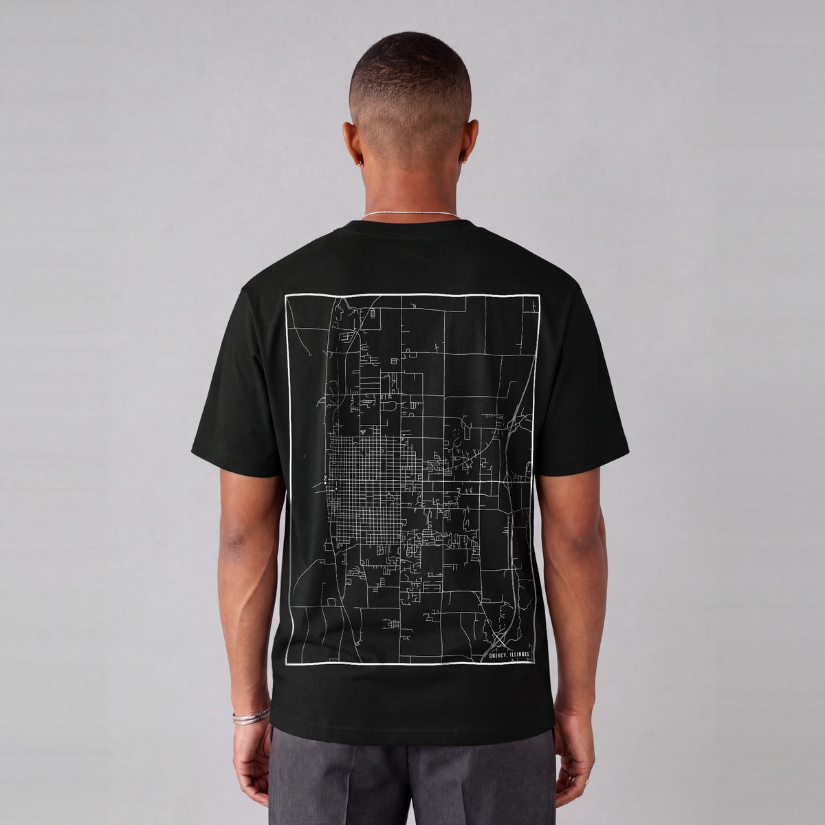Quincy map tee, back print on model - Black