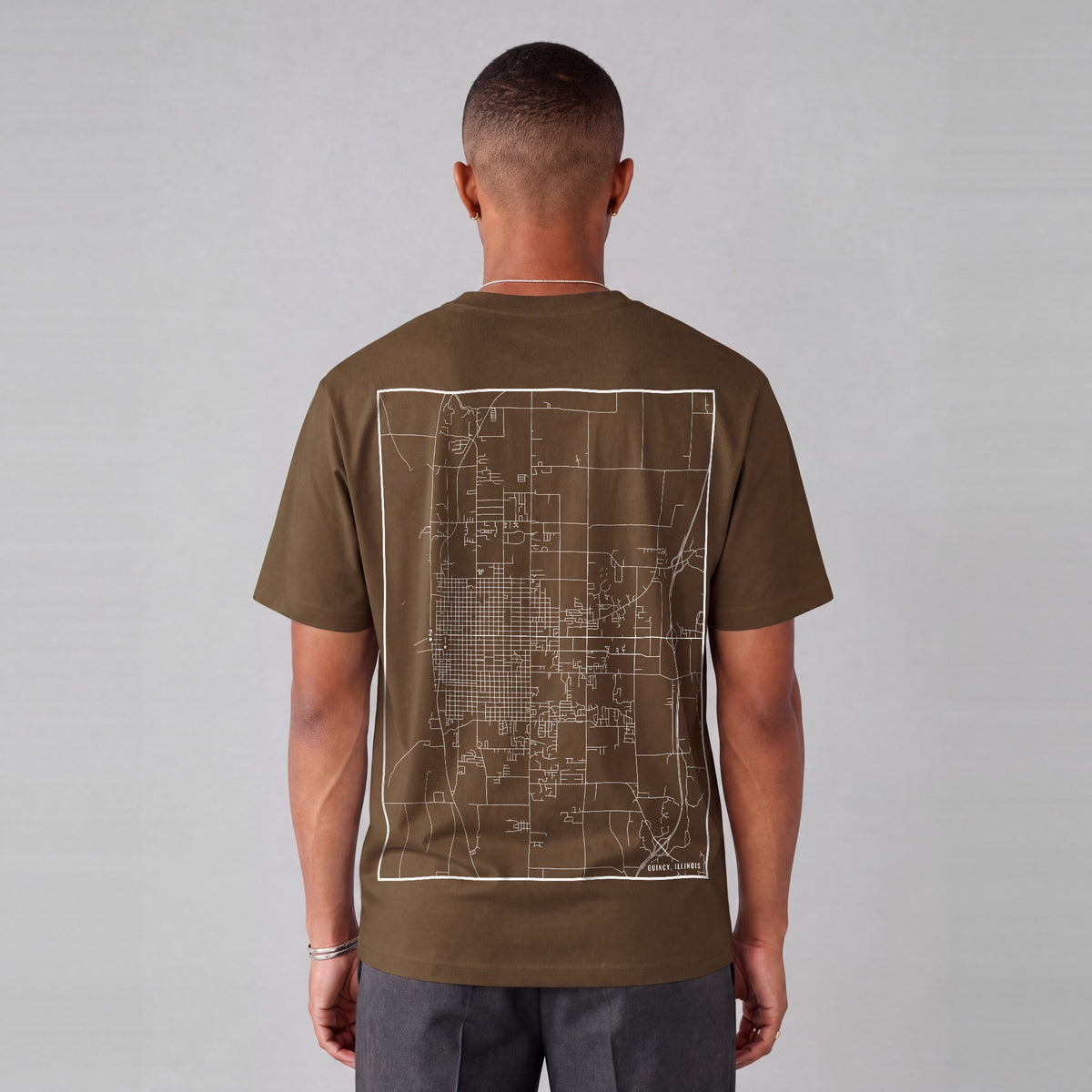 Quincy map tee, back print on model - Coffee