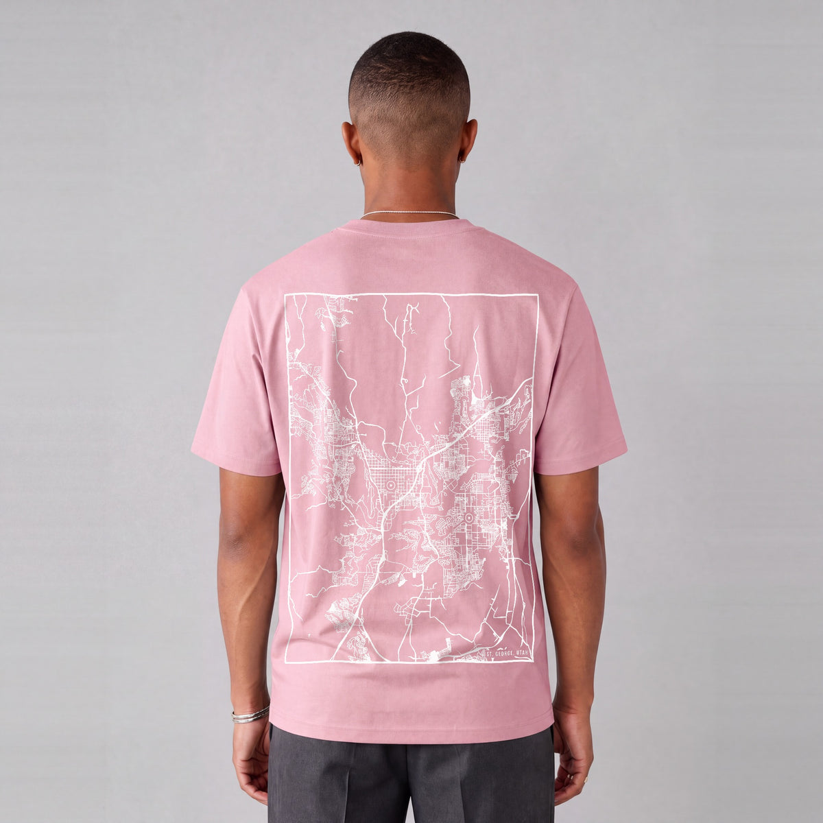 St. George map tee, back print on model - Pink