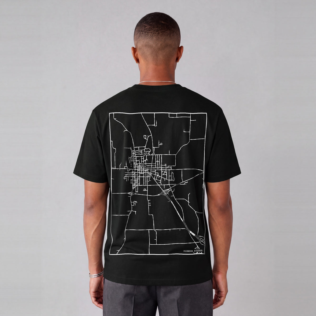 Richmond map tee, back print on model - Black