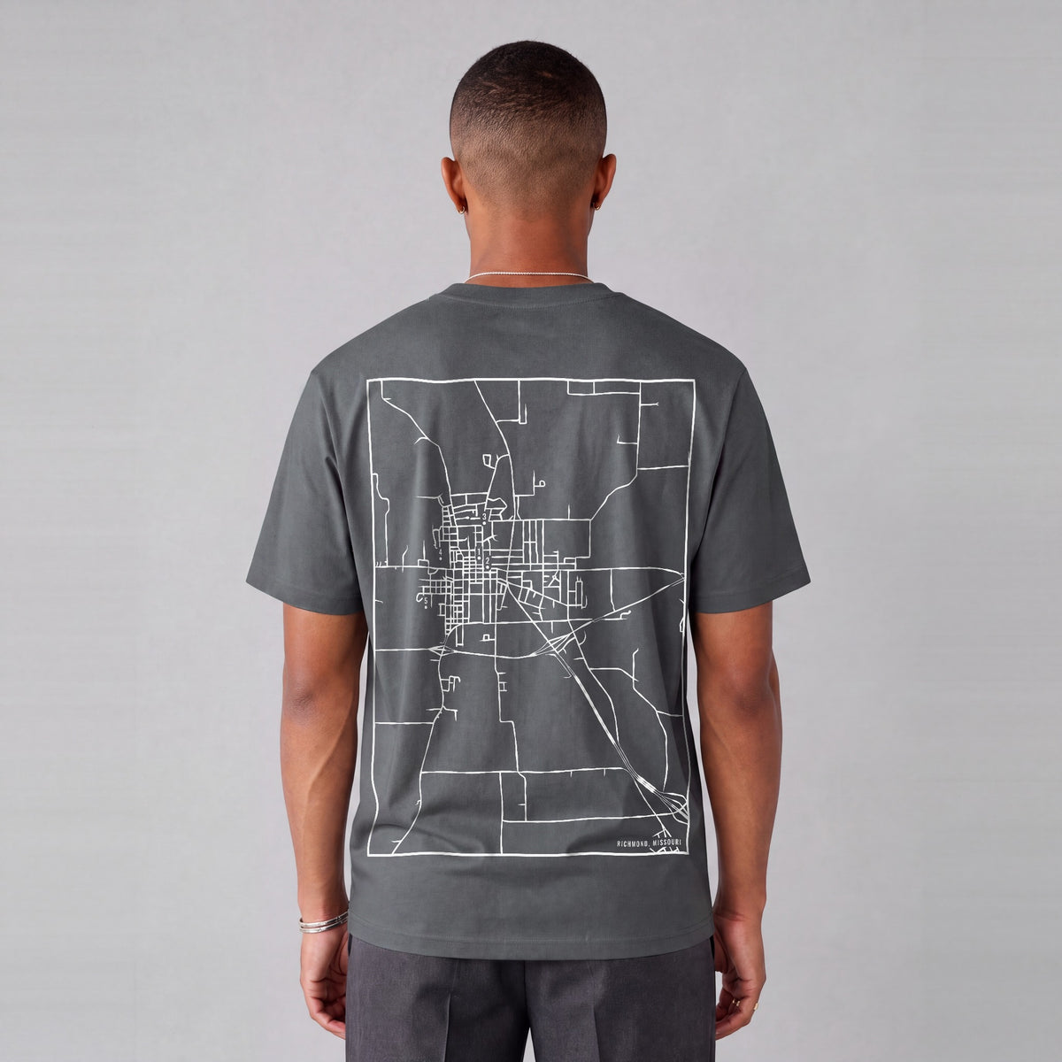 Richmond map tee, back print on model - Charcoal
