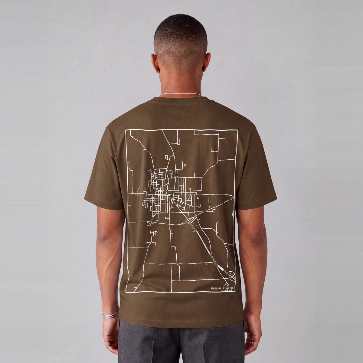 Richmond map tee, back print on model - Coffee