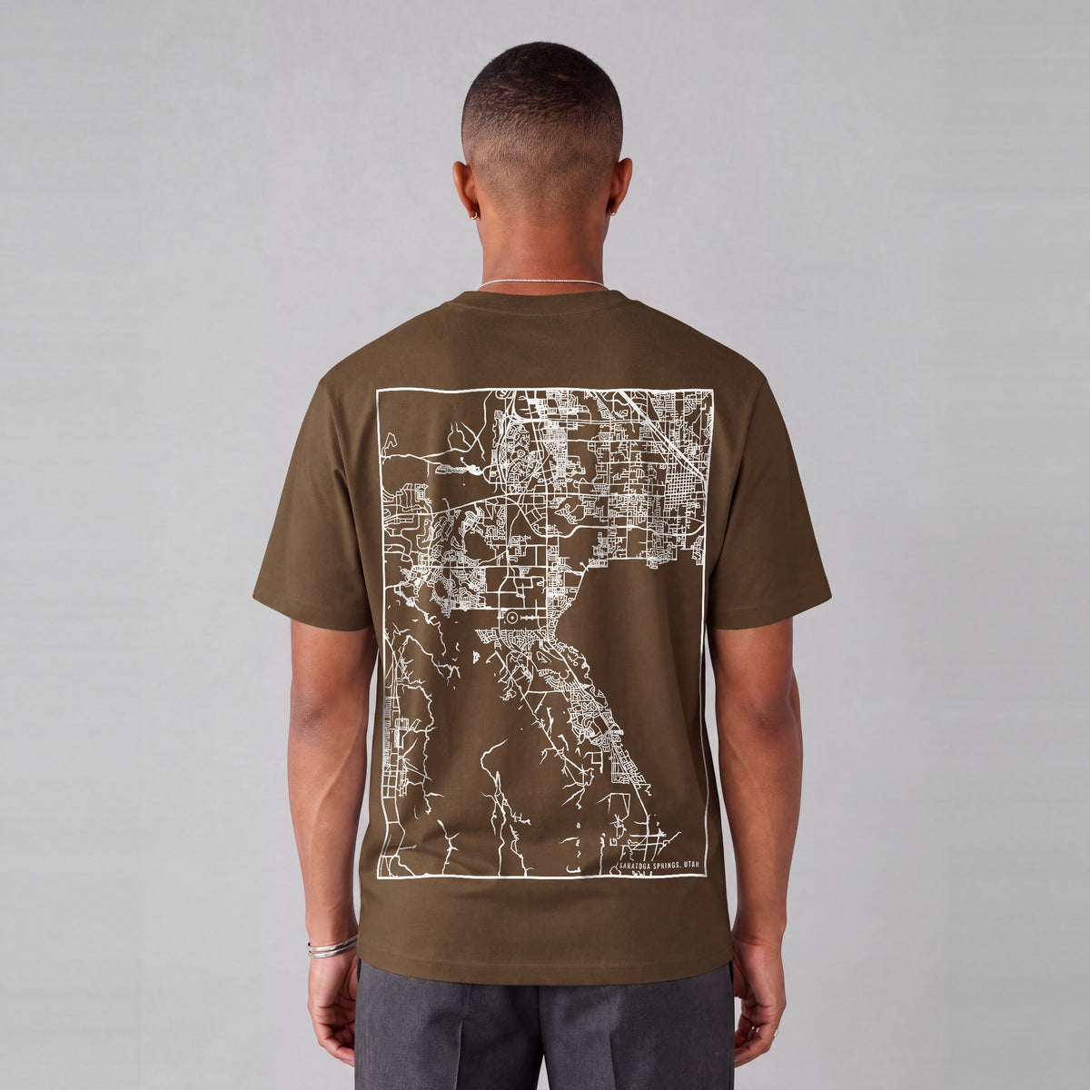 Saratoga Springs map tee, back print on model - Coffee