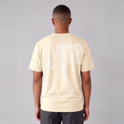 Saratoga Springs map tee, back print on model - Cream