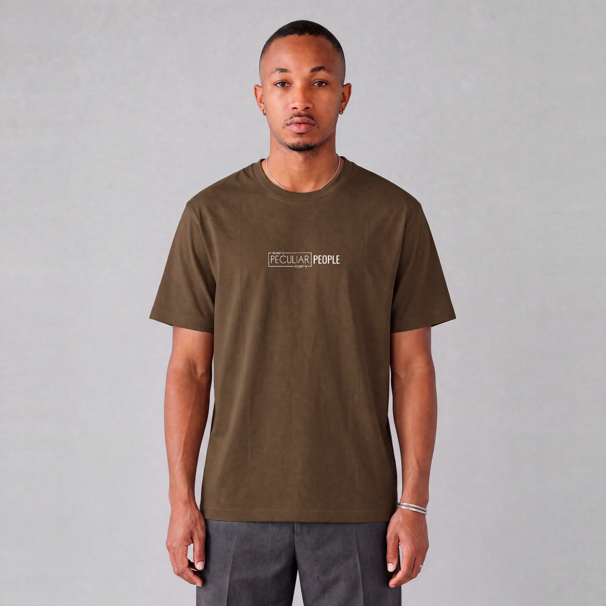 Saratoga Springs map tee, front logo on model - Coffee