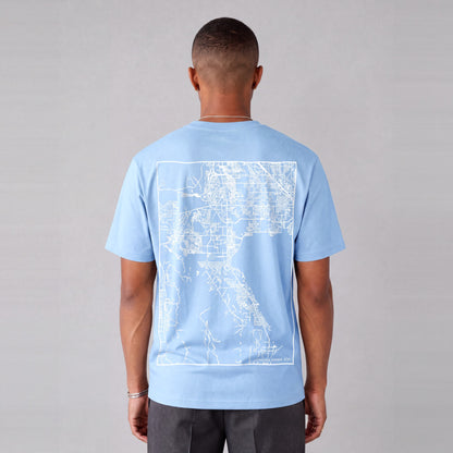 Saratoga Springs map tee, back print on model - Light Blue