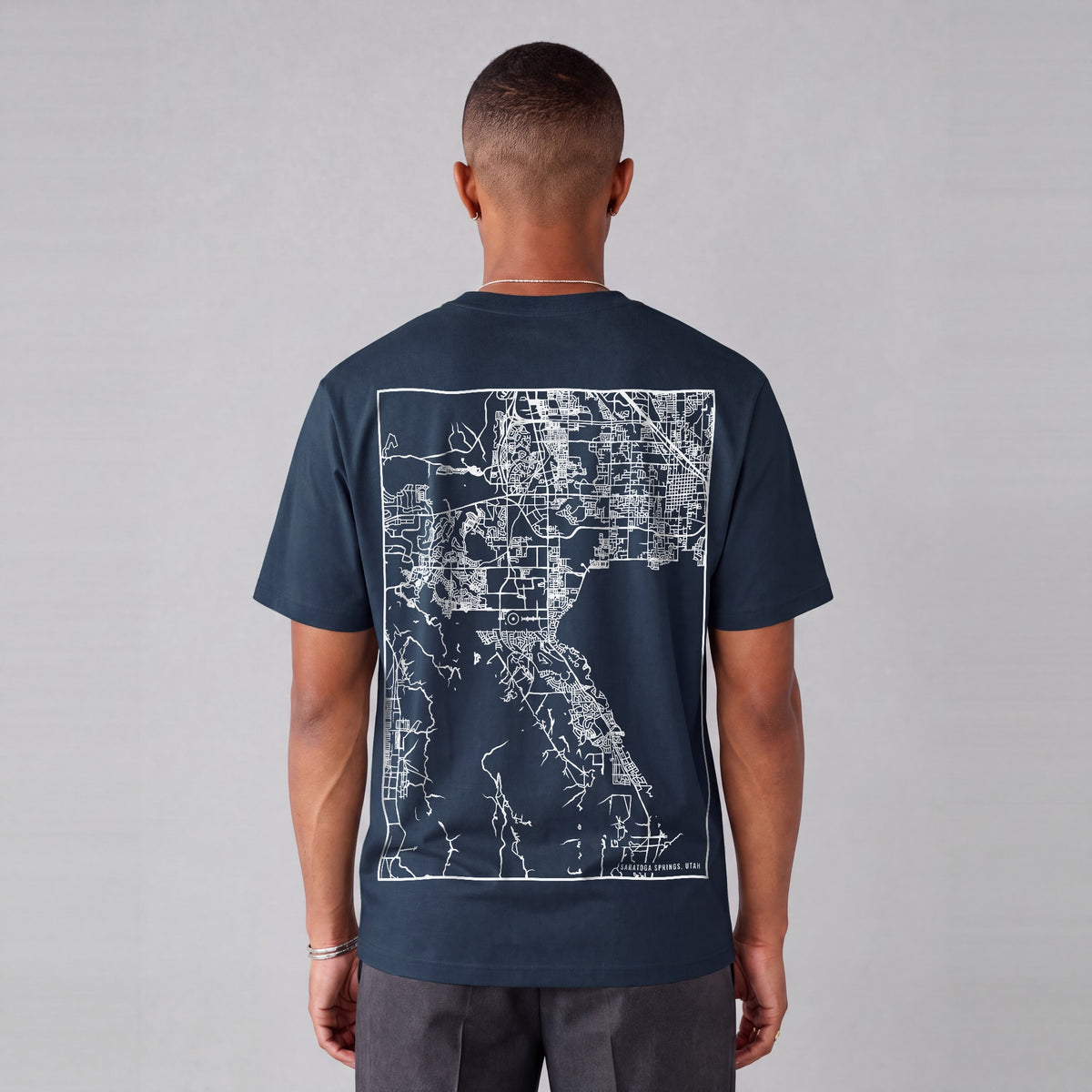 Saratoga Springs map tee, back print on model - Navy Blue