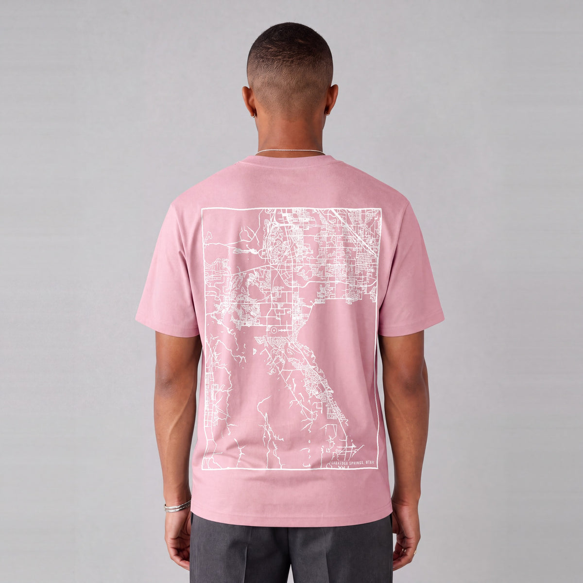 Saratoga Springs map tee, back print on model - Pink