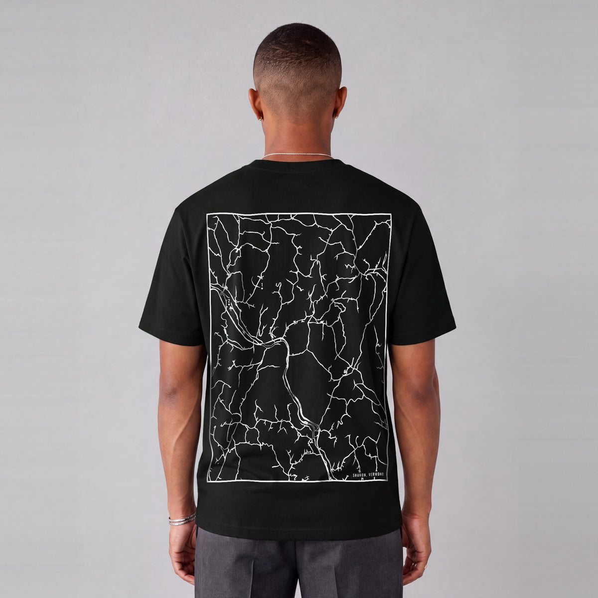 Sharon map tee, back print on model - Black