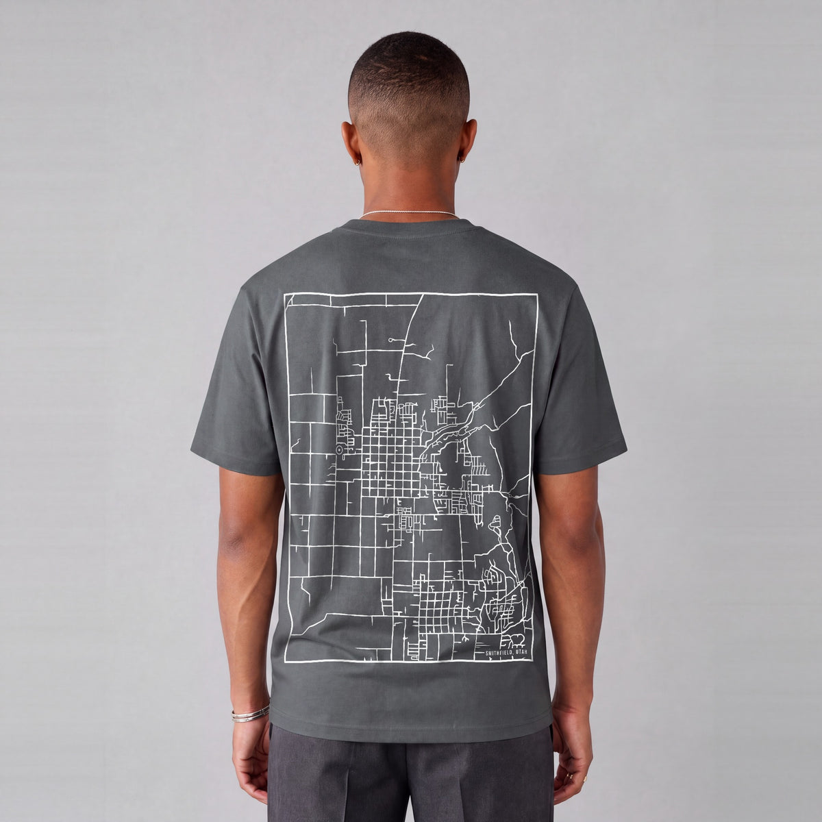 Smithfield map tee, back print on model - Charcoal
