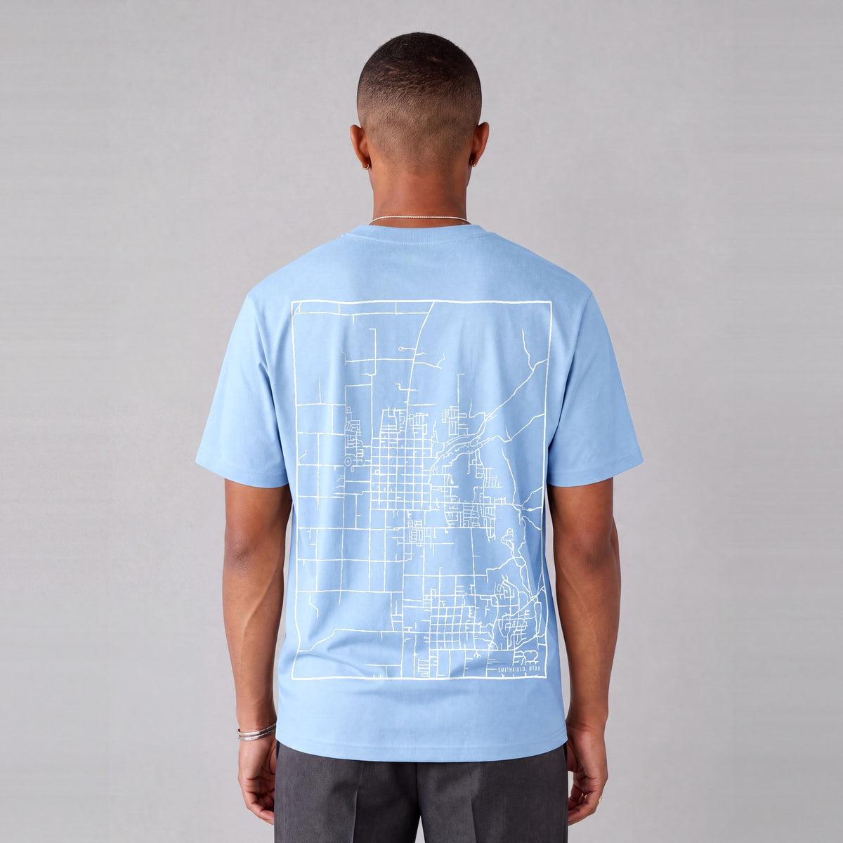 Smithfield map tee, back print on model - Light Blue