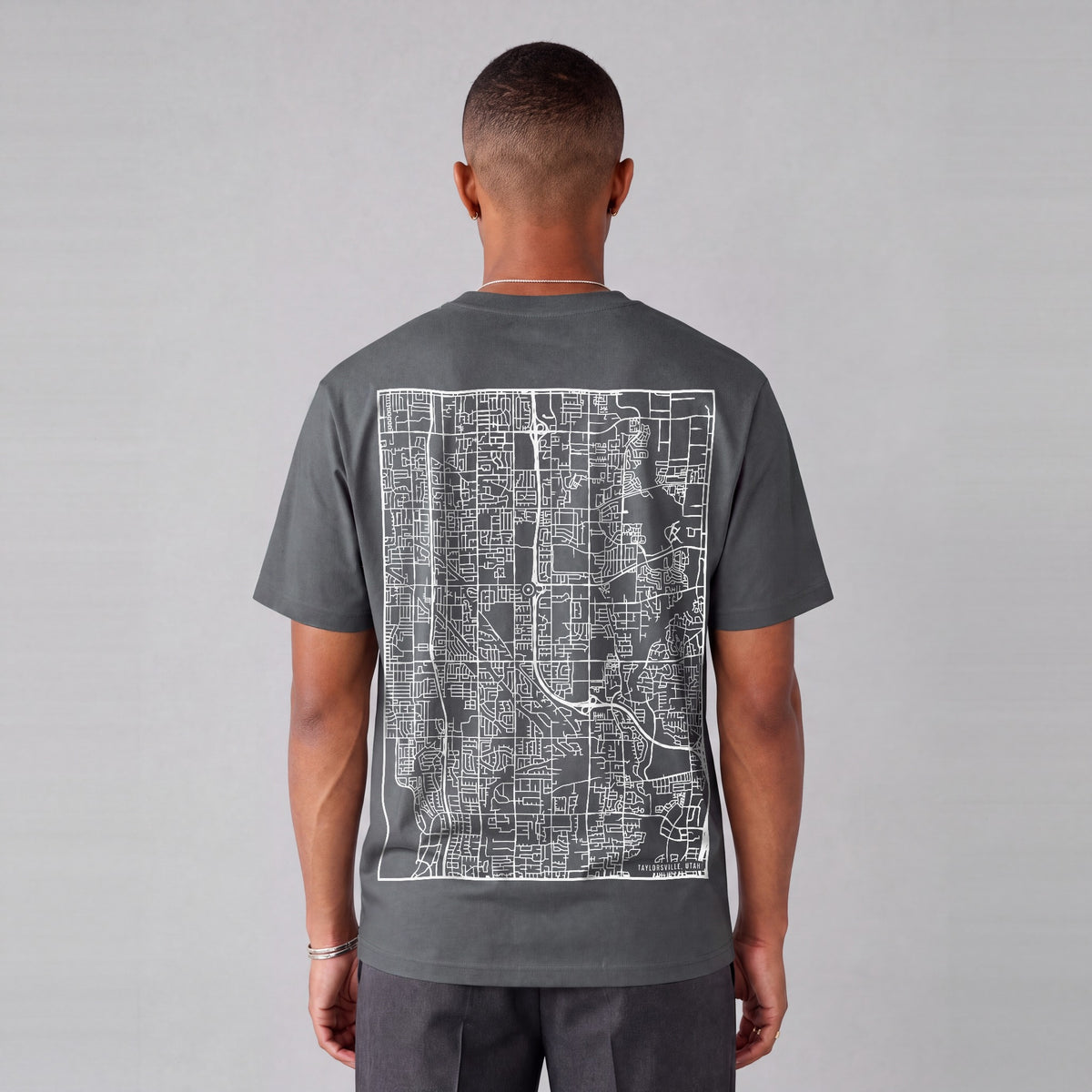 Taylorsville map tee, back print on model - Charcoal
