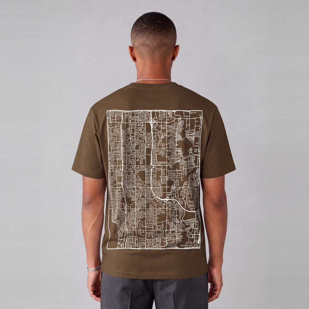 Taylorsville map tee, back print on model - Coffee