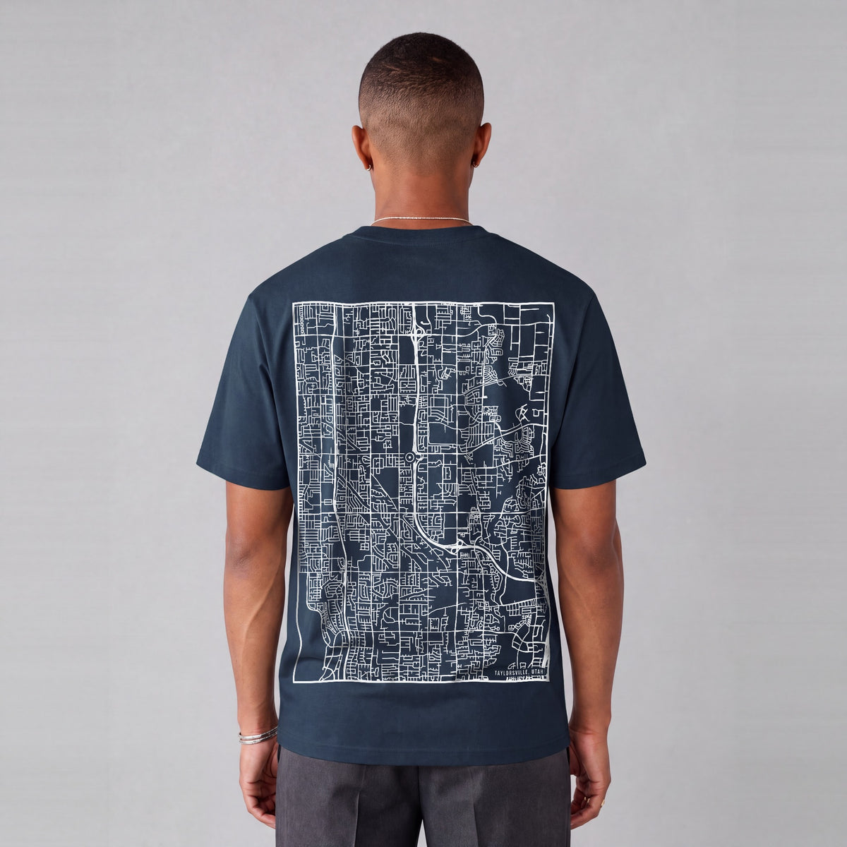 Taylorsville map tee, back print on model - Navy Blue