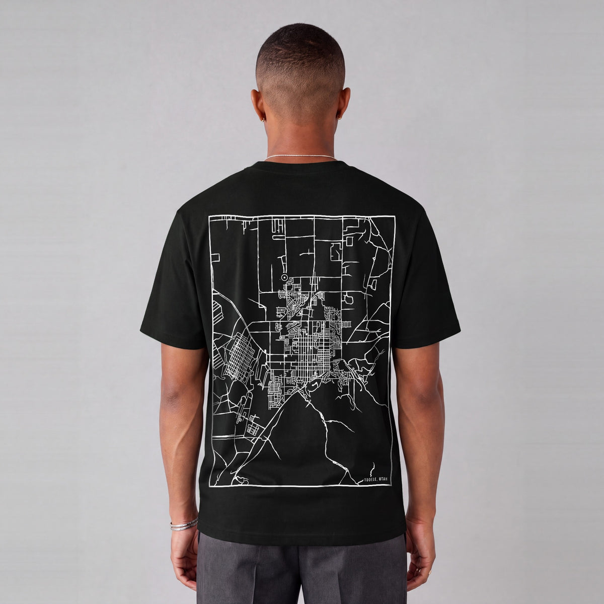Tooele map tee, back print on model - Black