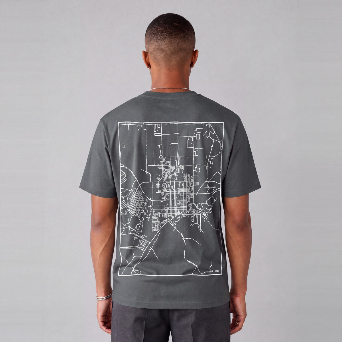 Tooele map tee, back print on model - Charcoal