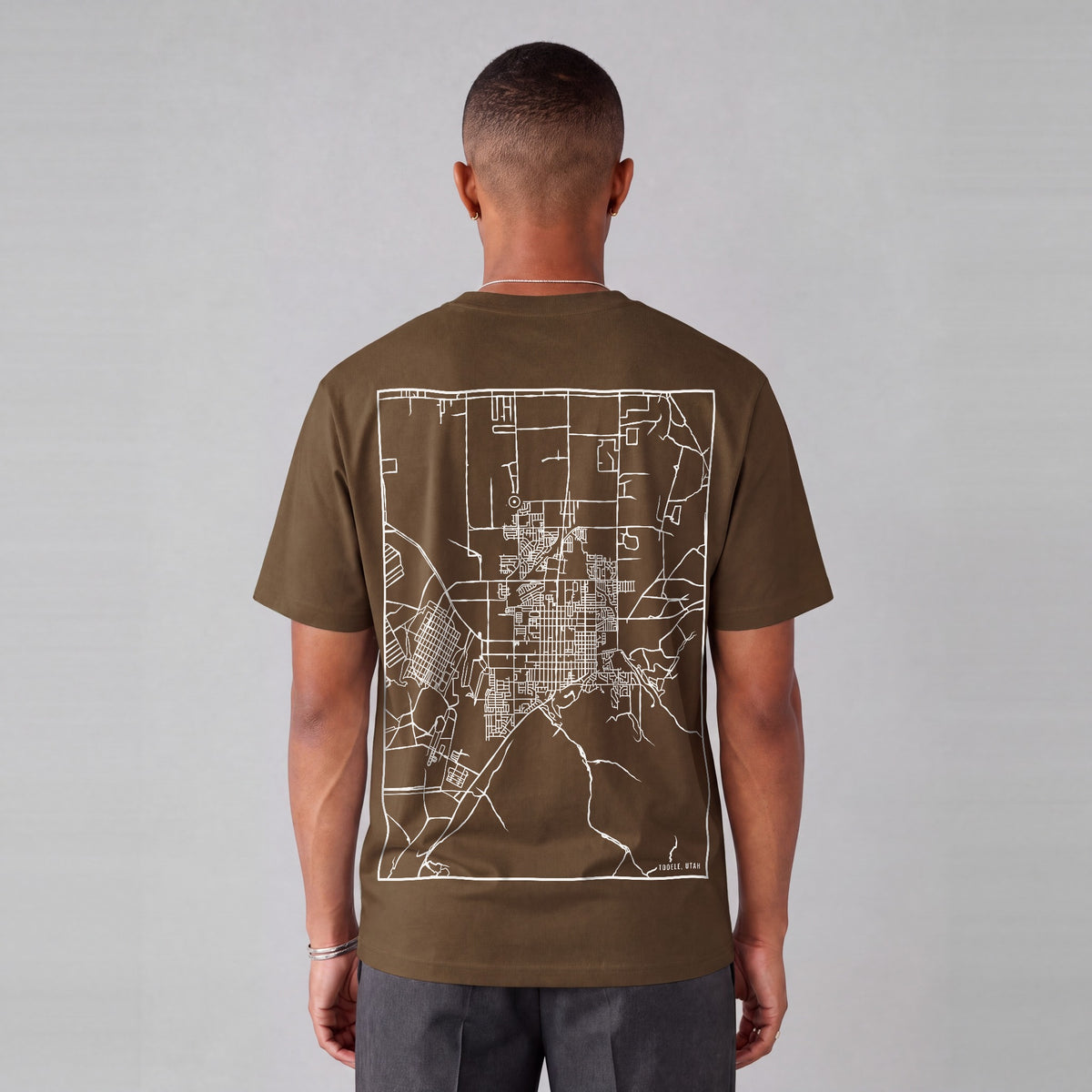 Tooele map tee, back print on model - Coffee