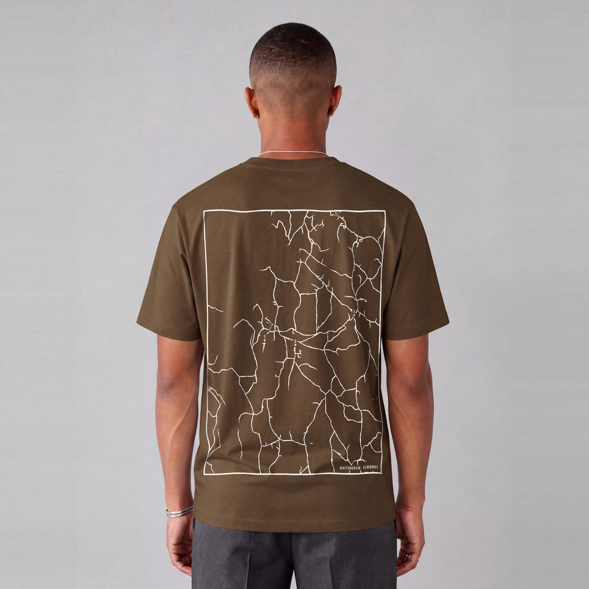 Whitingham map tee, back print on model - Coffee