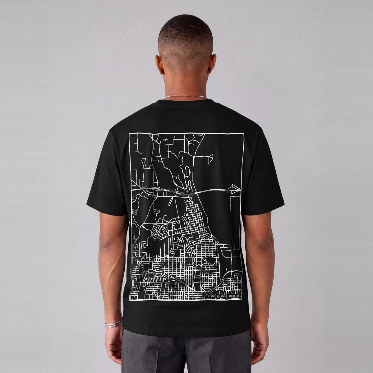 Winter Quarters map tee, back print on model - Black