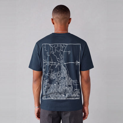 Winter Quarters map tee, back print on model - Navy Blue