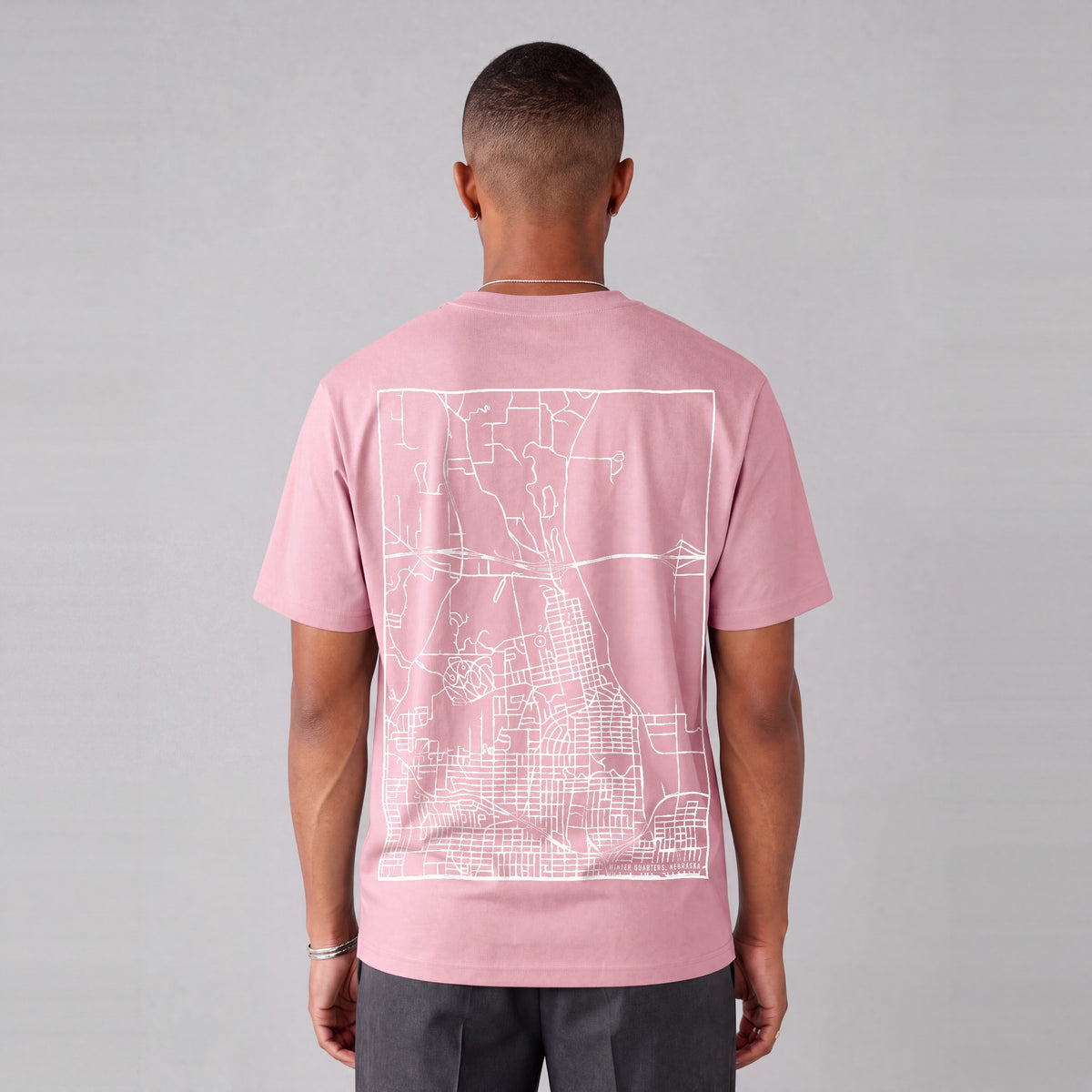 Winter Quarters map tee, back print on model - Pink