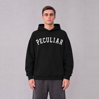 "Peculiar" collegiate hoodie front print on model - Black