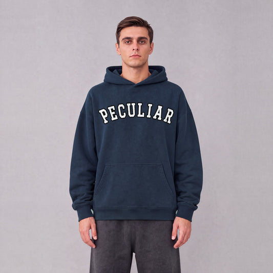 "Peculiar" collegiate hoodie front print on model - Navy Blue