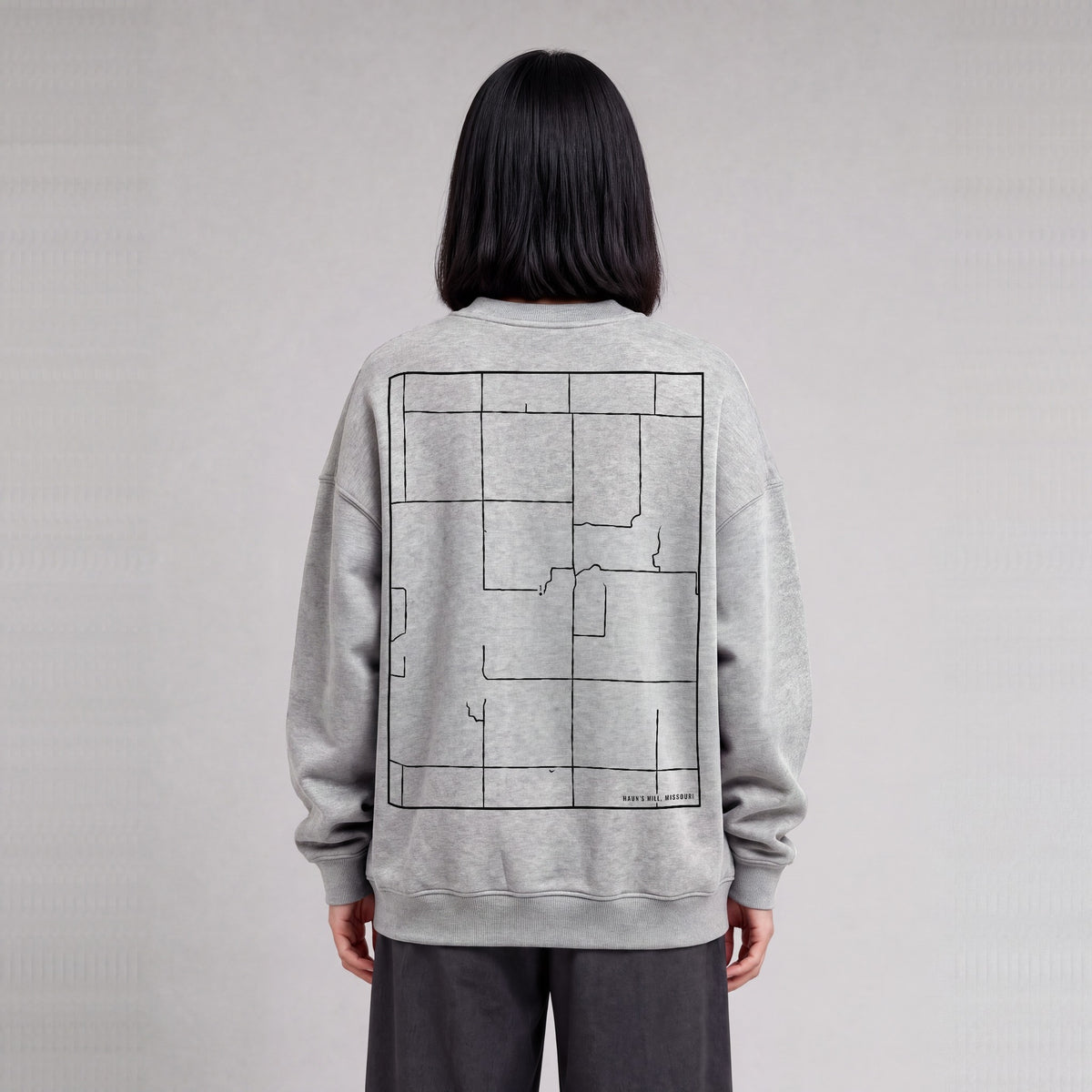 Haun's Mill map sweatshirt, back print on model - Heather Gray
