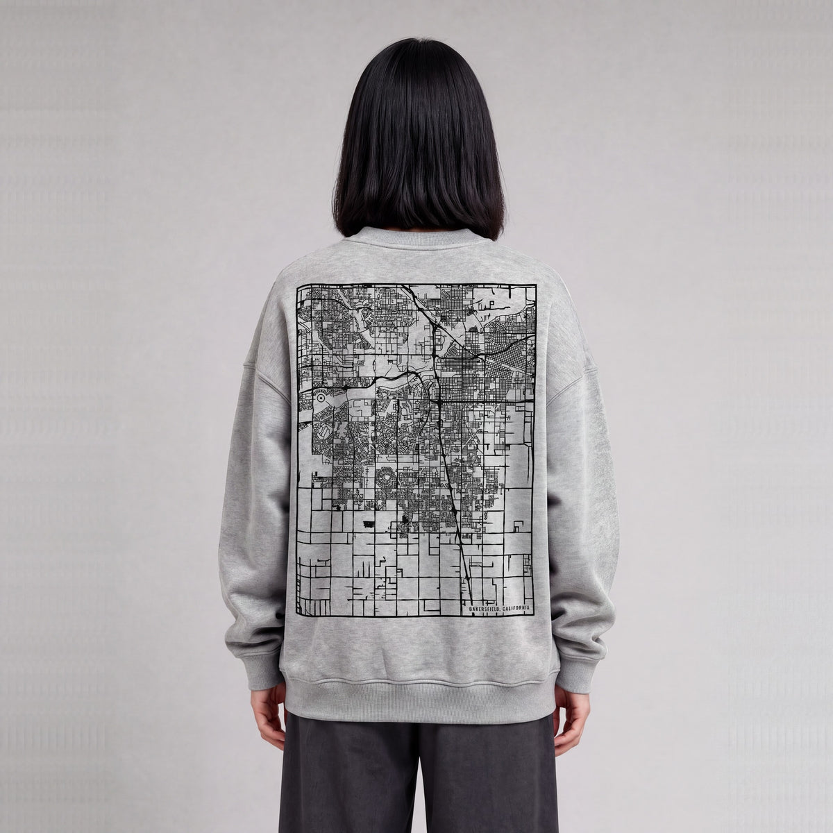 Bakersfield map sweatshirt, back print on model - Heather Gray